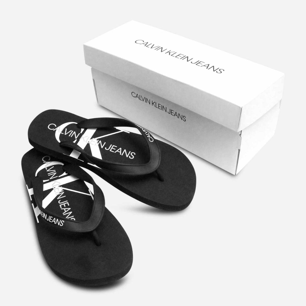 Black calvin klein flip flops discount