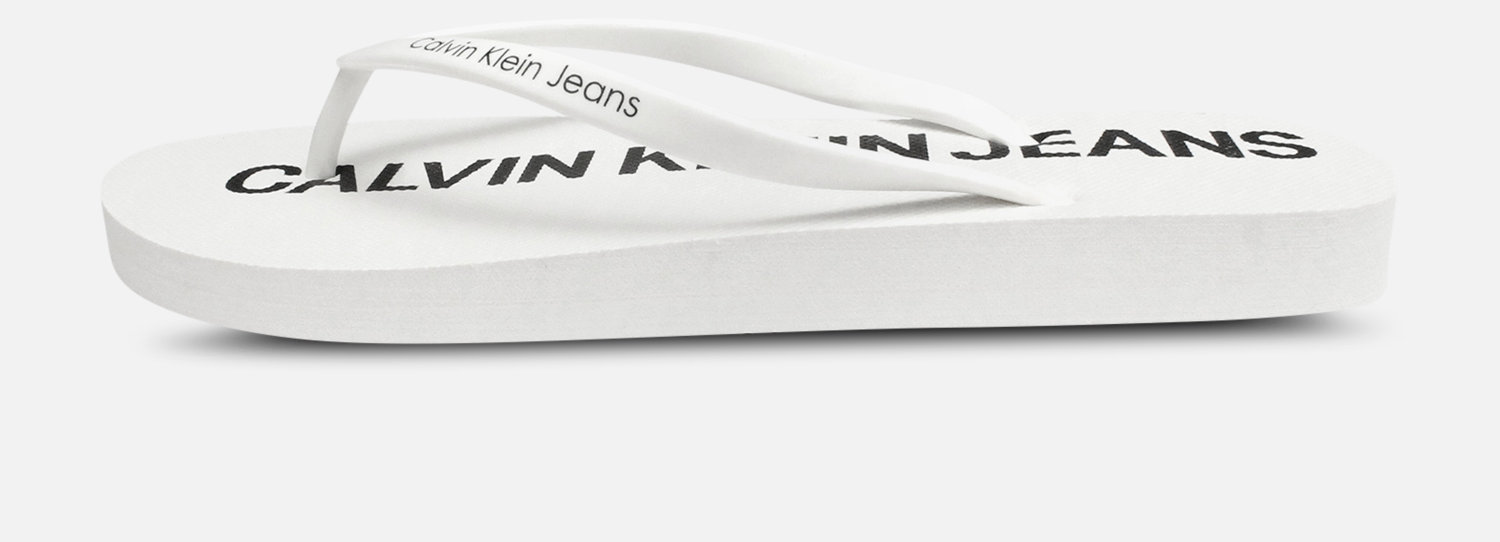 Calvin Klein Designer Dori Flip Flop Sandals in White