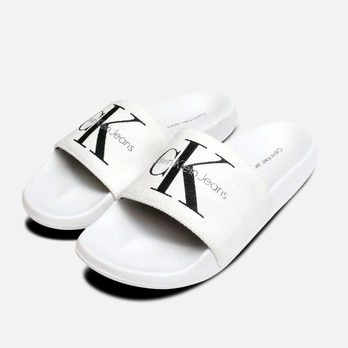 white canvas flip flops