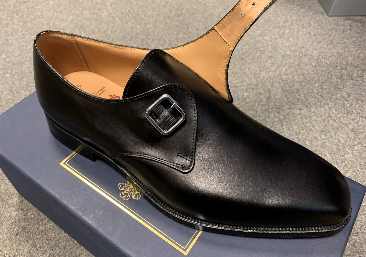 Example of a monk strap shoe opened up